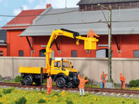Kibri H0 - 14991 - H0 Zweiwege UNIMOG GleisBau mit Arbeitskran und Korb **Auslauf**